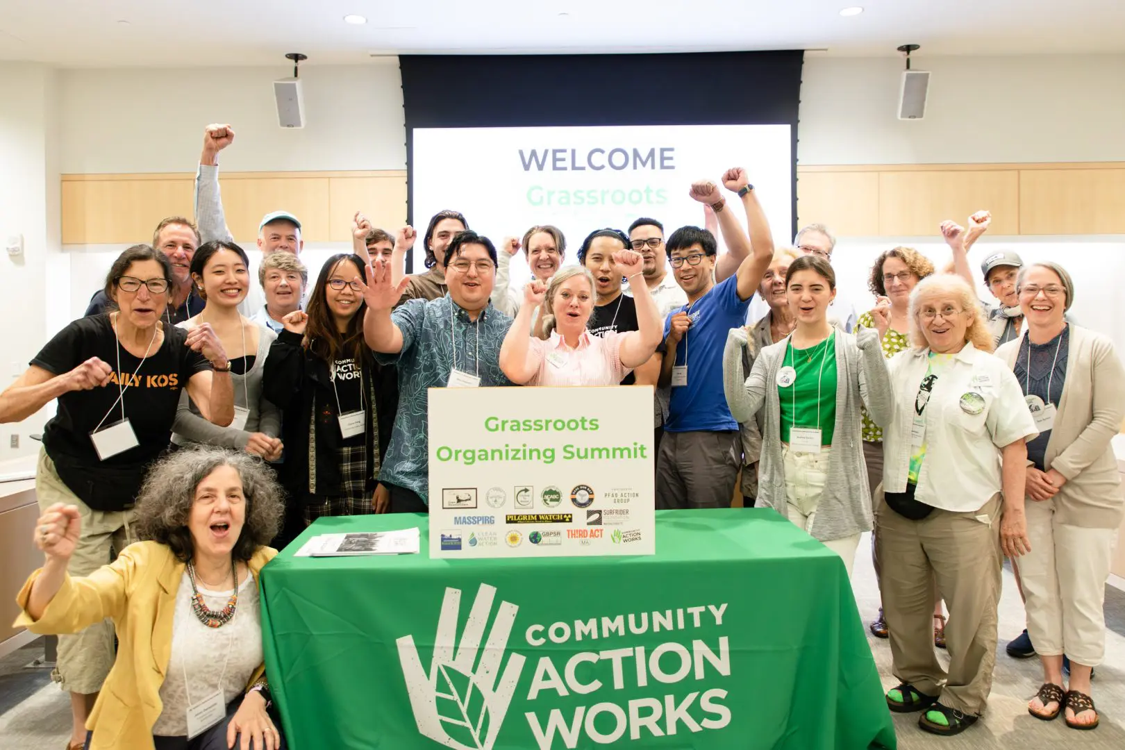 Organizing Committee celebrating at the Grassroots Organizing Summit. Photo Credit: Adam Perri